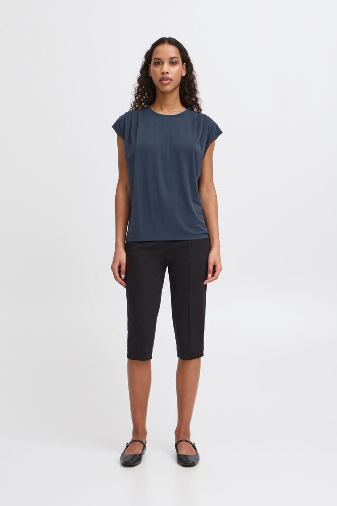 T-shirt blu con pences