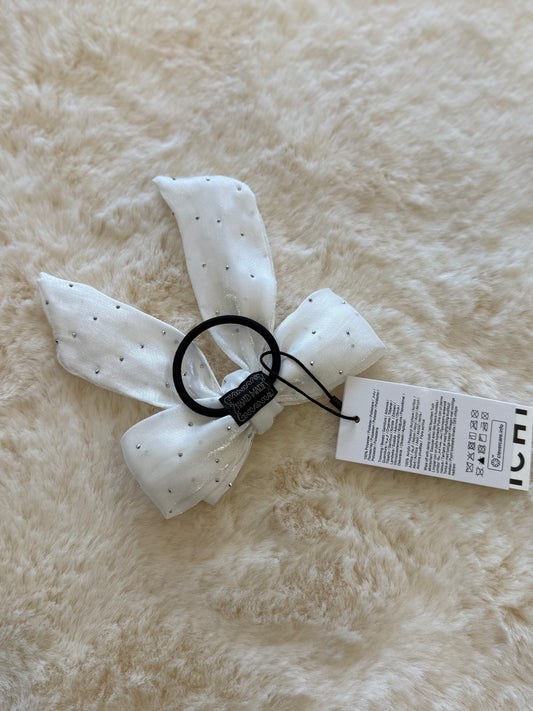 Laccetto per capelli con fiocco bianco