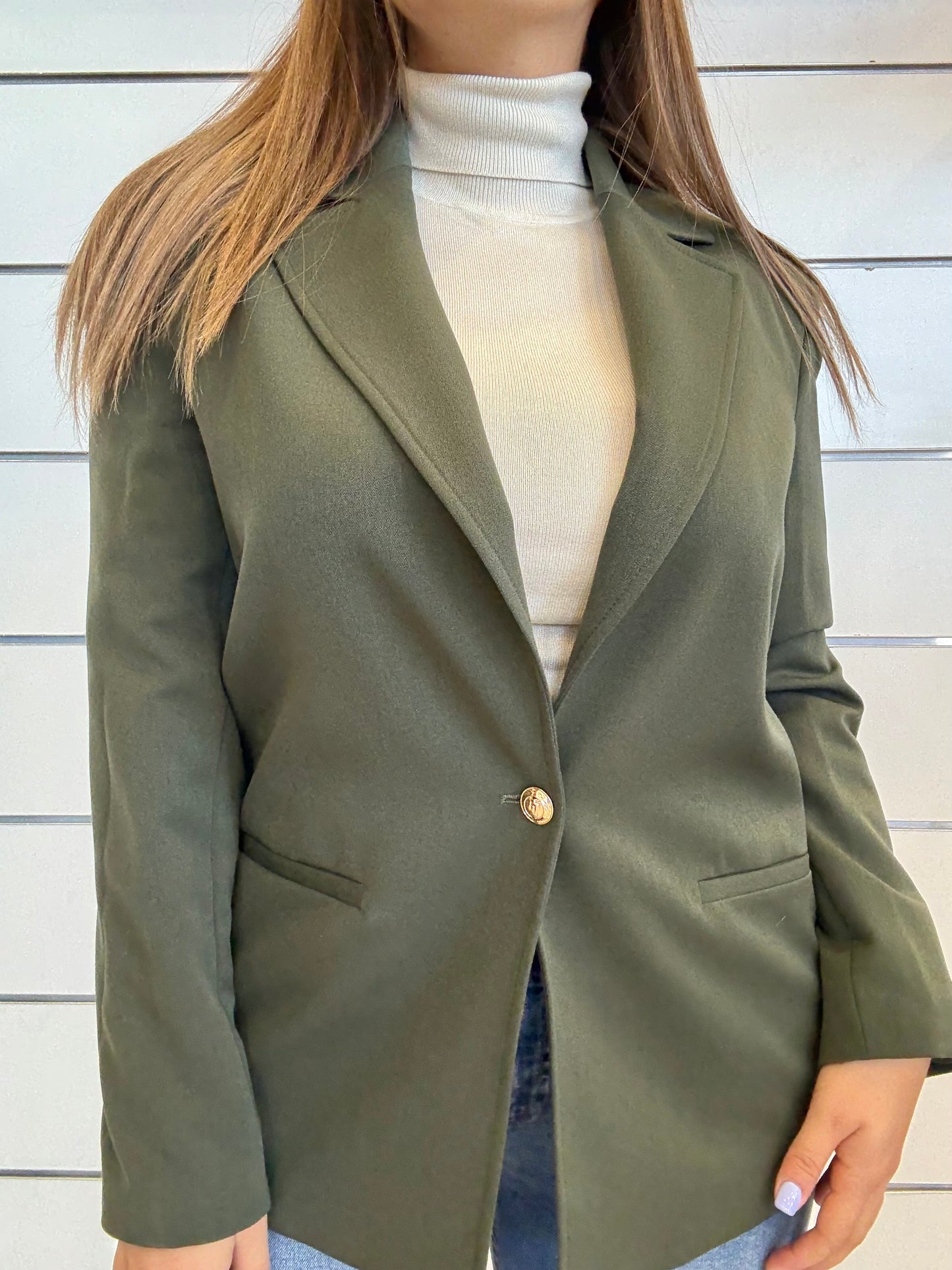 Blazer da donna con tasche a filetto in verde scuro, elegante e versatile per ogni occasione