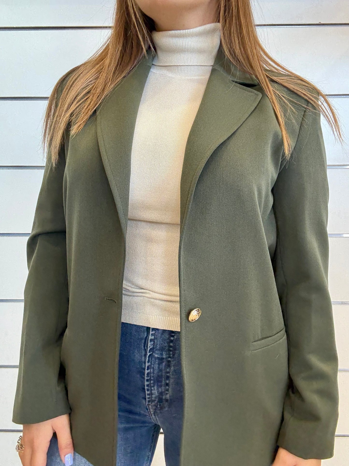 Blazer da donna con tasche a filetto in verde scuro, elegante e versatile
