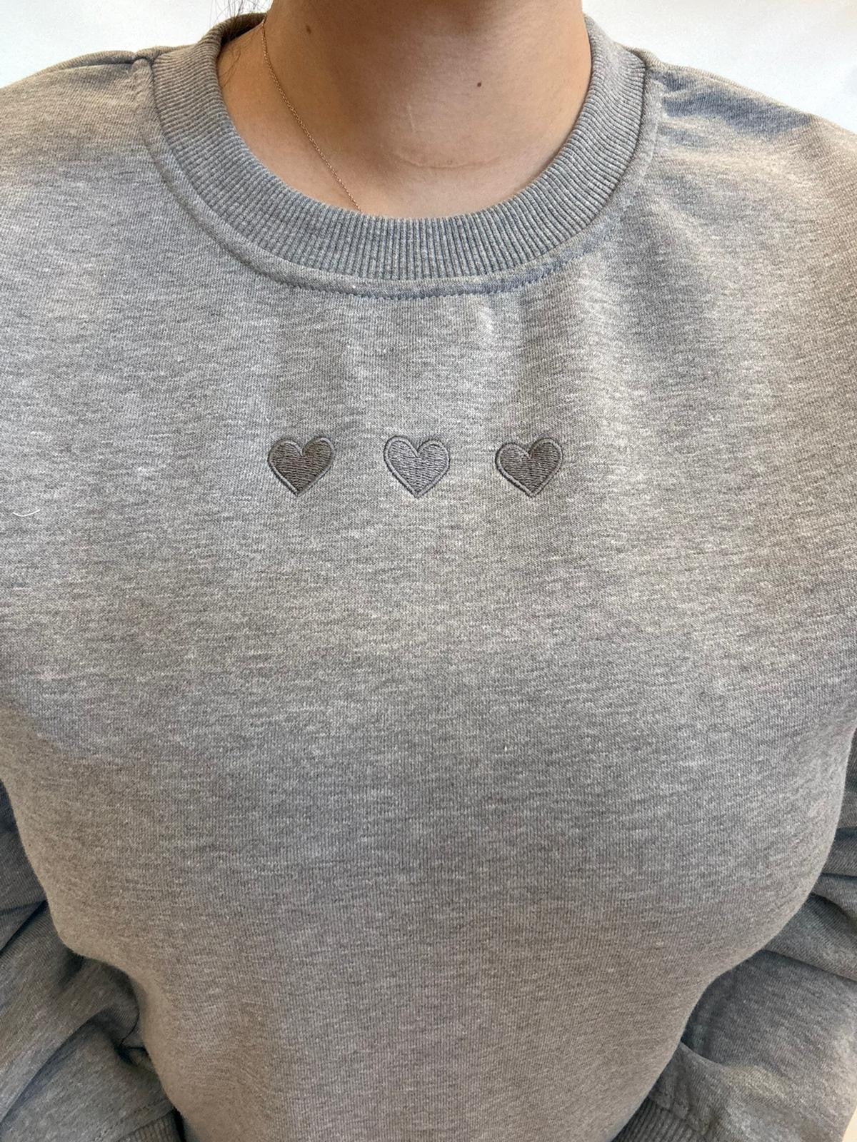 Felpa girocollo con cuoricini