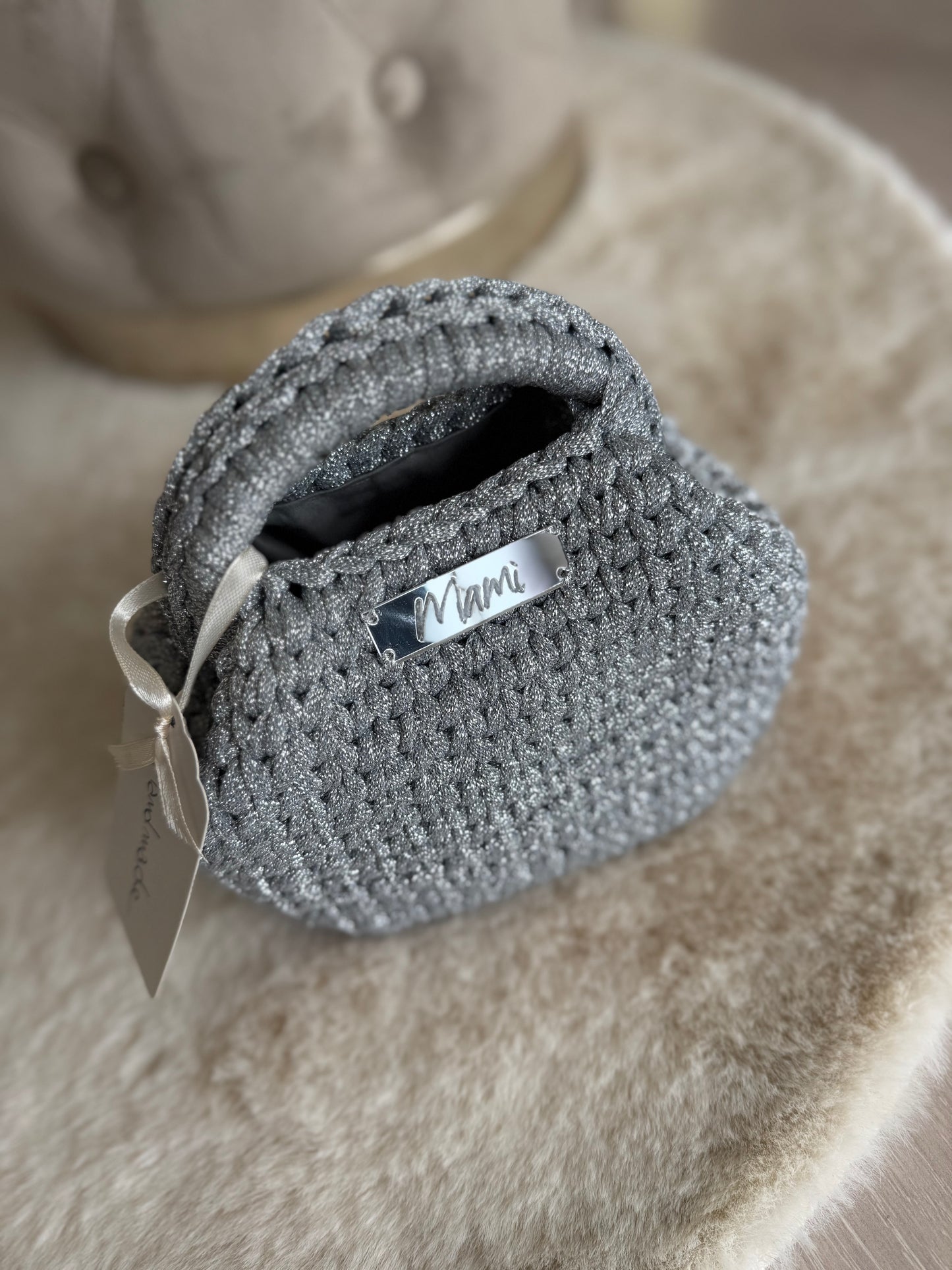Borsa a mano Mamì modello mini clutch argento in elegante tessuto intrecciato