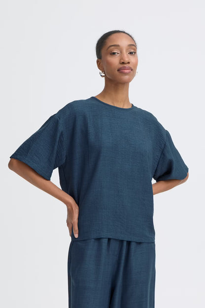 T-shirt con fiocchi sul retro