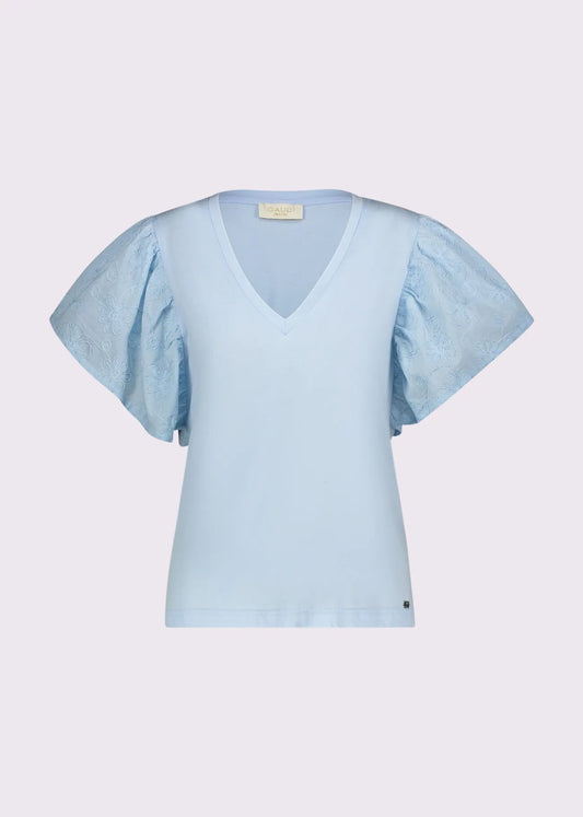 T-shirt azzurra da donna con scollo a V