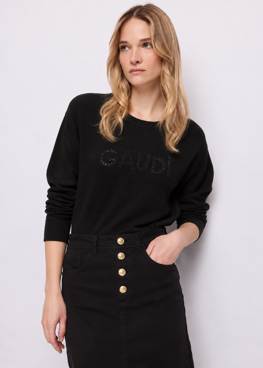 Maglia nera da donna con borchie e strass