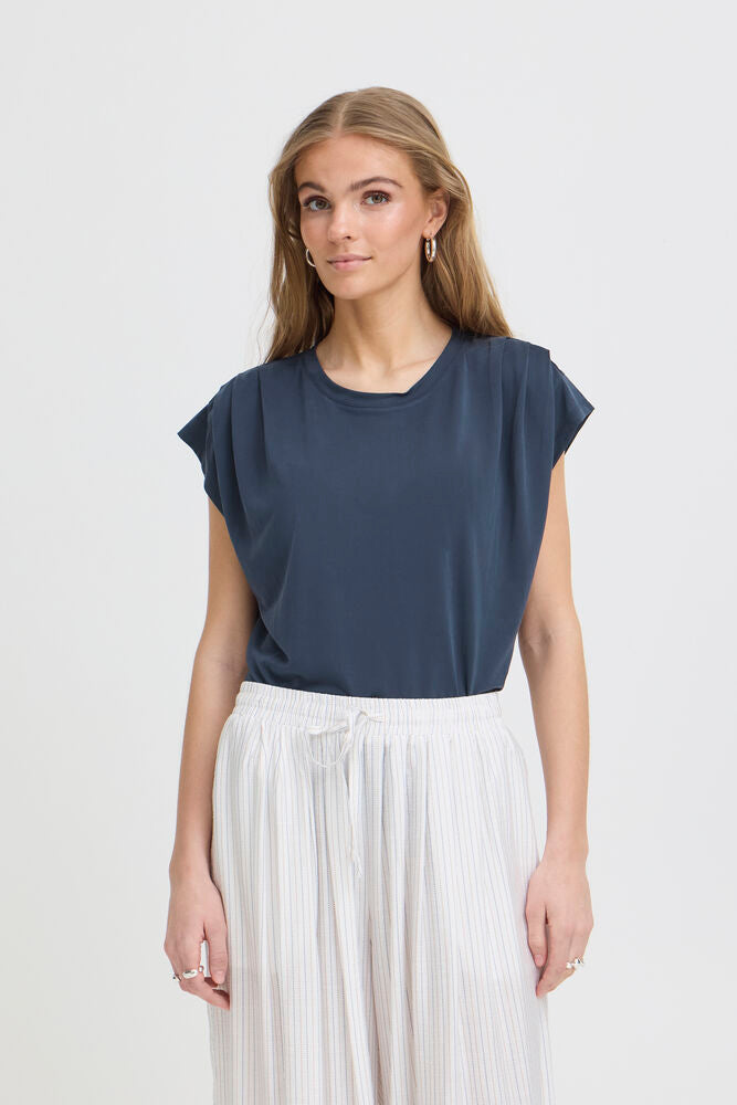 T-shirt blu con pences