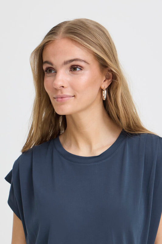 T-shirt blu con pences