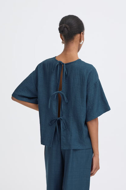T-shirt con fiocchi sul retro