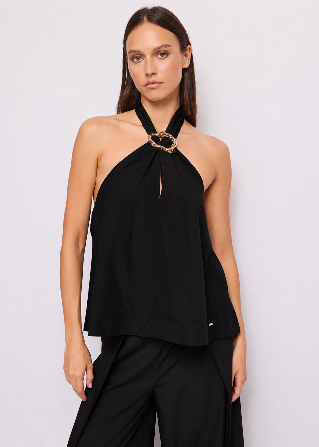 Top nero da donna con dettaglio gioiello