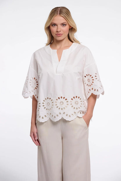 Blusa con ricami
