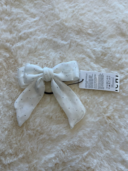 Laccetto per capelli con fiocco bianco