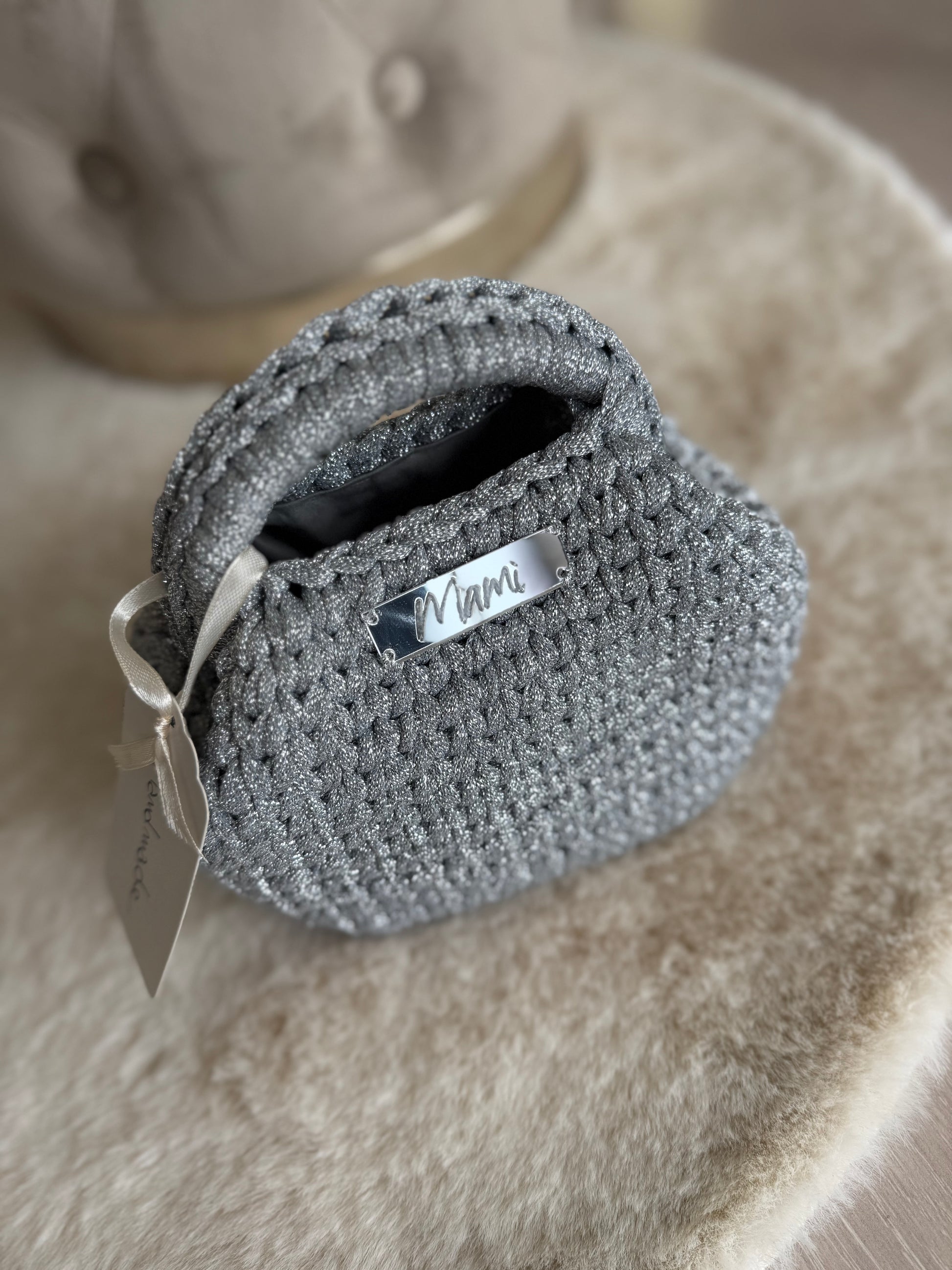 Borsa a mano Mamì modello mini clutch argento in elegante tessuto intrecciato