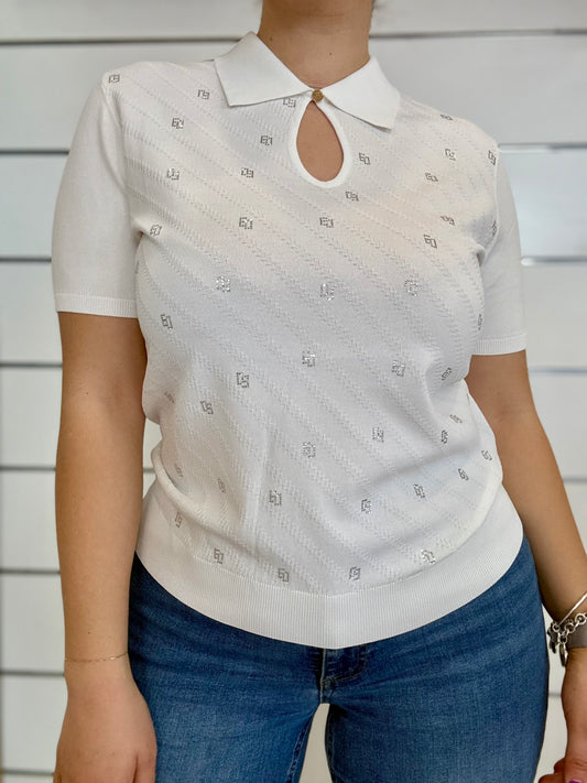Polo donna bianca con maniche corte di Gaudì con strass e scollatura a chiave