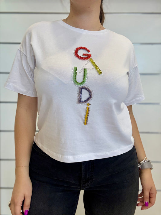 T-shirt donna bianca con logo e strass di Gaudì con dettagli colorati sul davanti